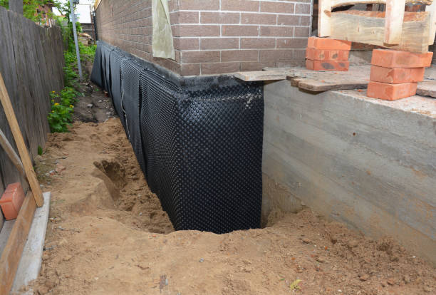 Happy homeowners after waterproofing job in Spotsylvania